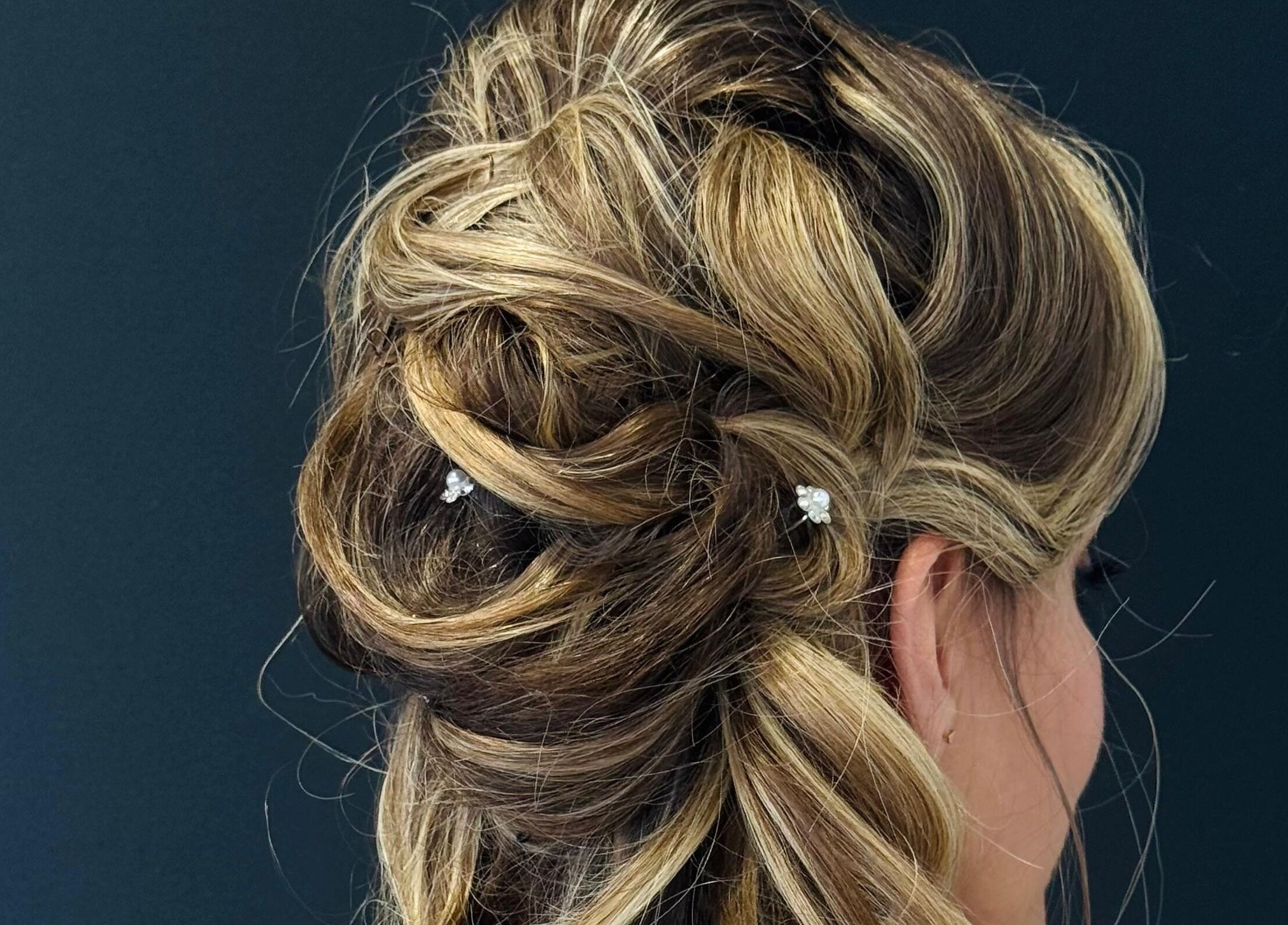 Stylish updo hairstyle at Planet Stella hair salon, North Miami Beach, Florida, US.