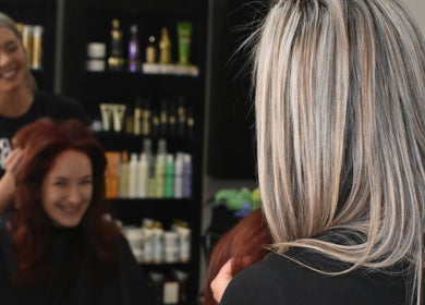 Stylists at Rejuven8 on Dexter Salon in Cape Town crafting vibrant looks for clients in Western Cape, ZA.