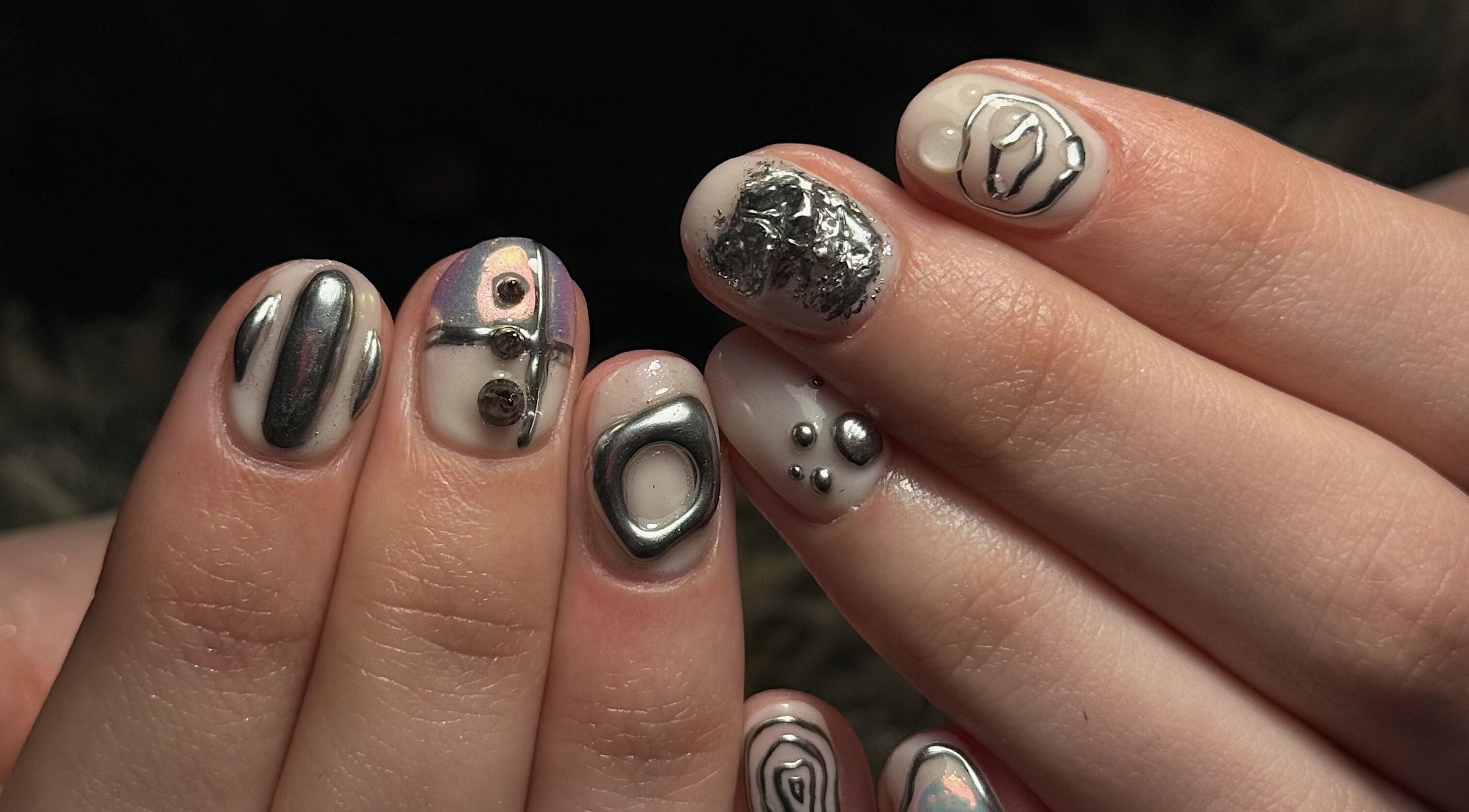 Unique metallic nail art at ChromeFangStudio & Northernfangs, North Shields, North Tyneside, England, GB.