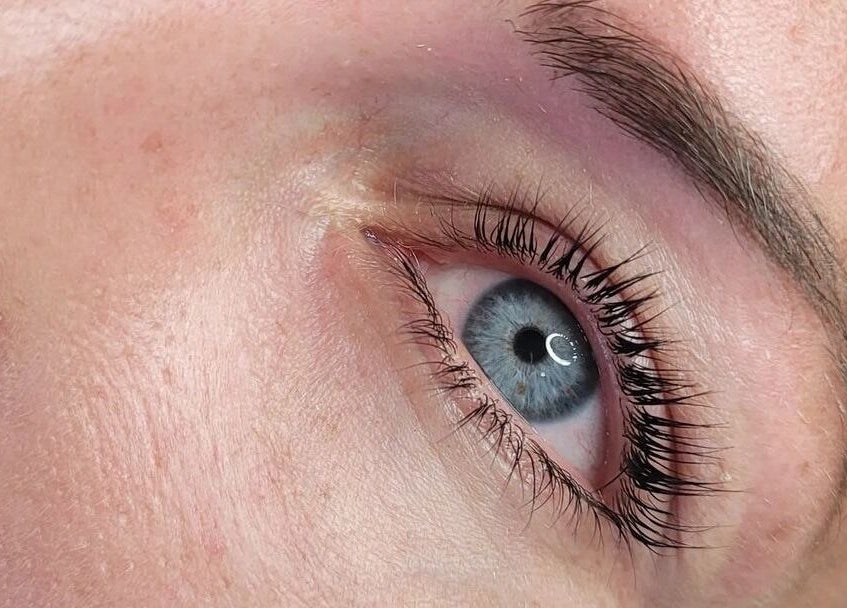 Highlighted blue eye with elegant lashes at Bootique Beauty in Brisbane, Queensland, AU.