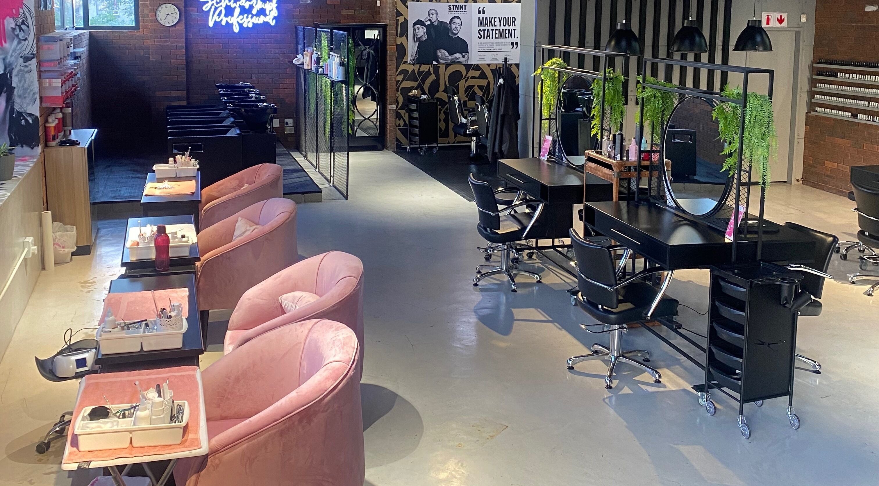 Modern beauty salon with plush pink chairs at Culture in Sandton, Gauteng, ZA.