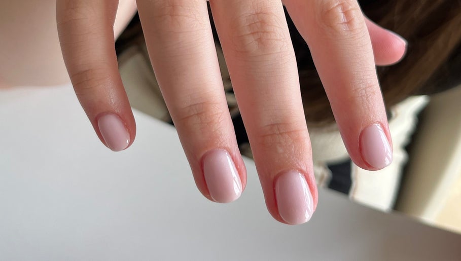 Elegant manicured nails at The BIAB Room, Cwmparc, Wales, GB featuring a polished soft pink finish.