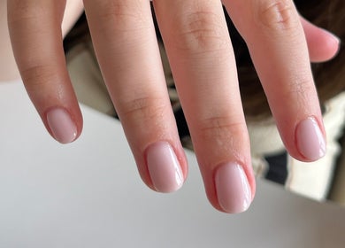 Elegant manicured nails at The BIAB Room, Cwmparc, Wales, GB featuring a polished soft pink finish.