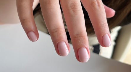 Elegant manicured nails at The BIAB Room, Cwmparc, Wales, GB featuring a polished soft pink finish.