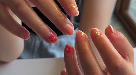 Elegant nail art featuring star designs at The BIAB Room, Cwmparc, Wales, GB.