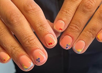 Colorful nail art design at The BIAB Room, Cwmparc, Wales, GB, showcasing intricate and trendy patterns.