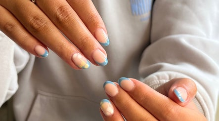 Elegant blue-tipped nails at The Biab Room, Cwmparc, Wales, GB. Perfect for enhancing beauty and style.