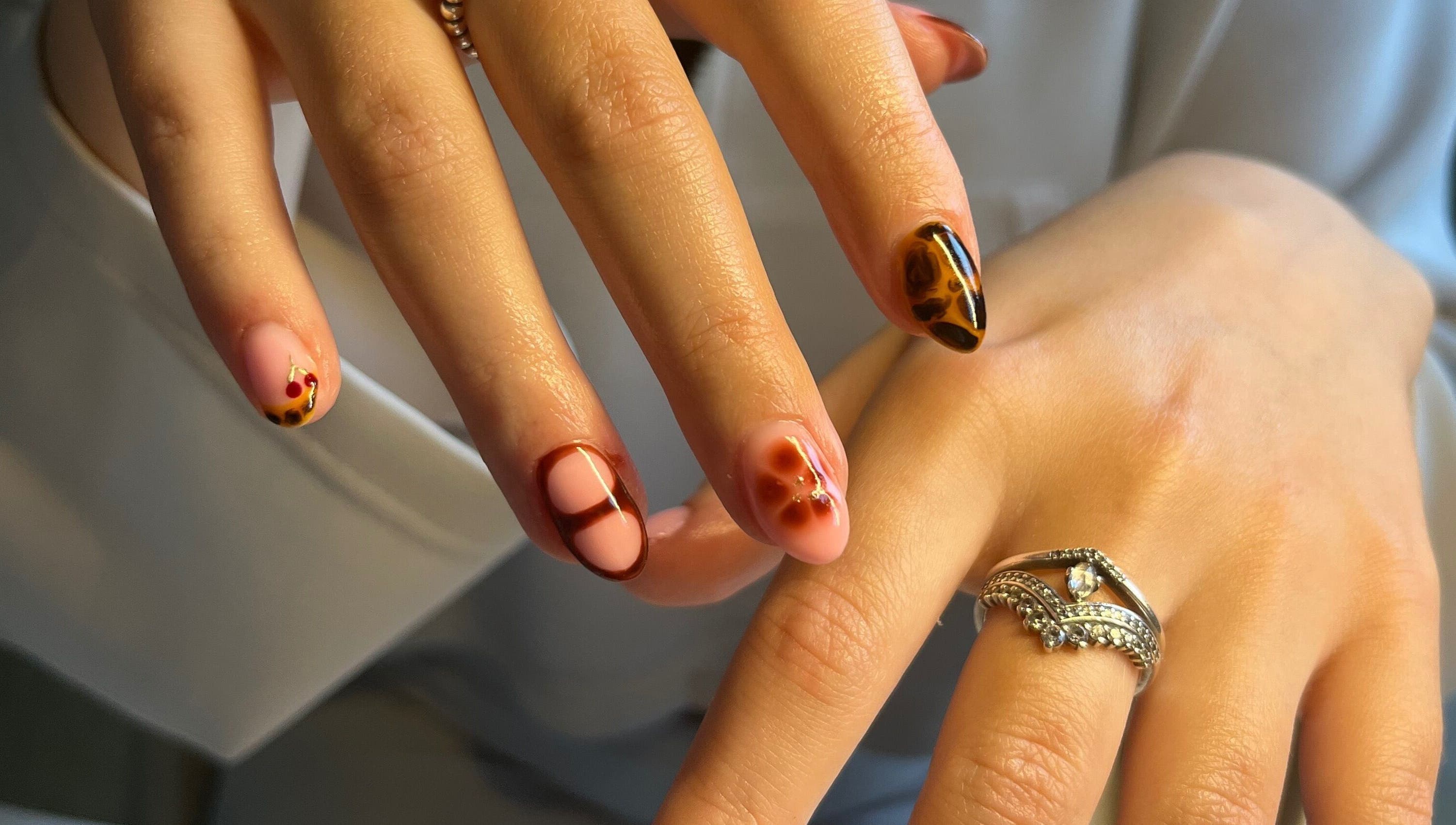 Elegant nail art with intricate designs at The Biab Room, Cwmparc, Wales, GB.