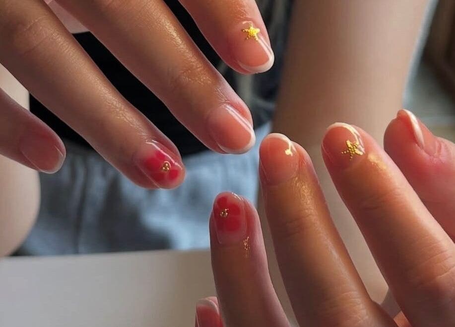 Nail art design at The Biab Room, Cwmparc, Wales, GB; detailed manicure close-up.