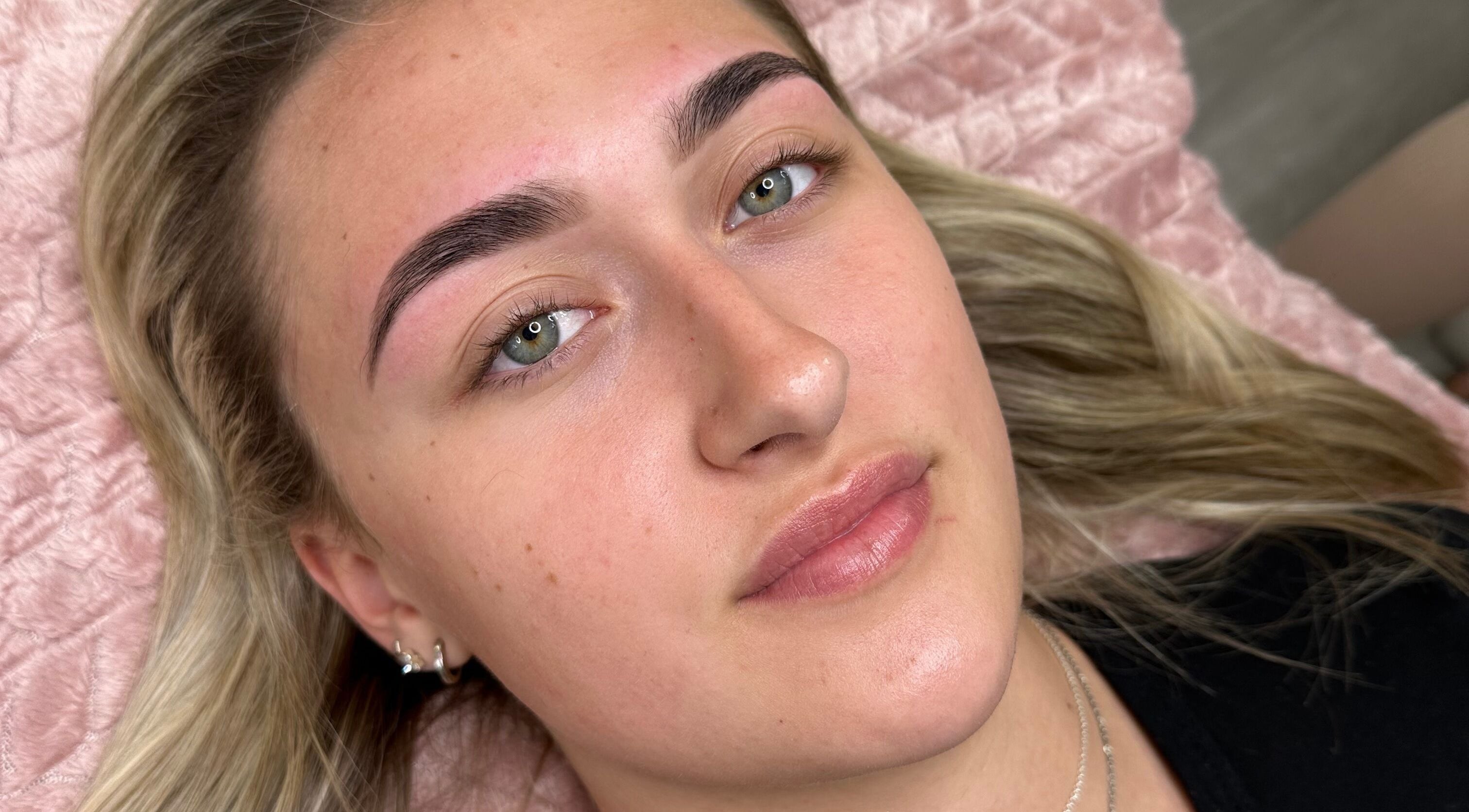 Perfectly shaped brows at Brow Envy, Littleborough, England, GB. Close-up shot highlighting expert grooming.