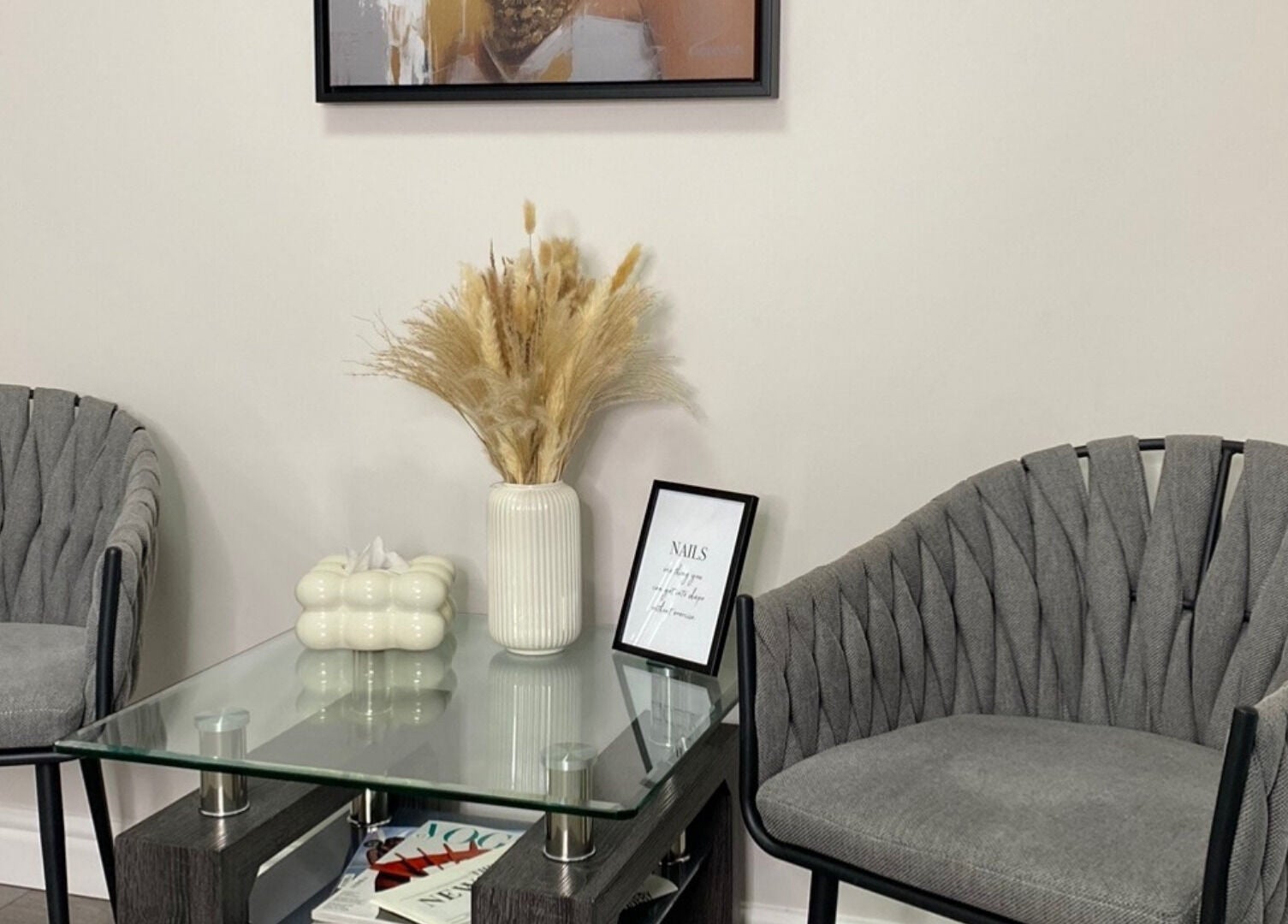 Cozy lounge at Zhekova Nails Academy, Epsom, England, GB with modern chairs and decor.