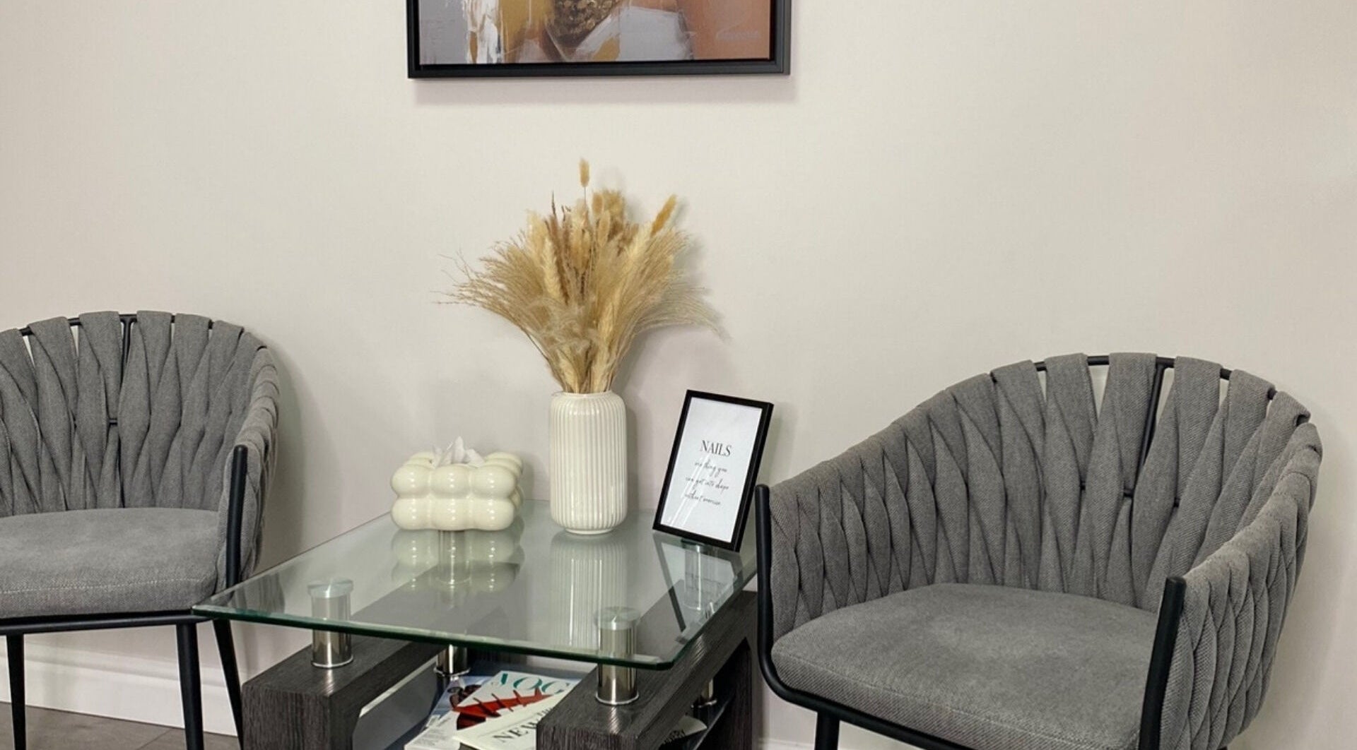 Cozy lounge at Zhekova Nails Academy, Epsom, England, GB with modern chairs and decor.