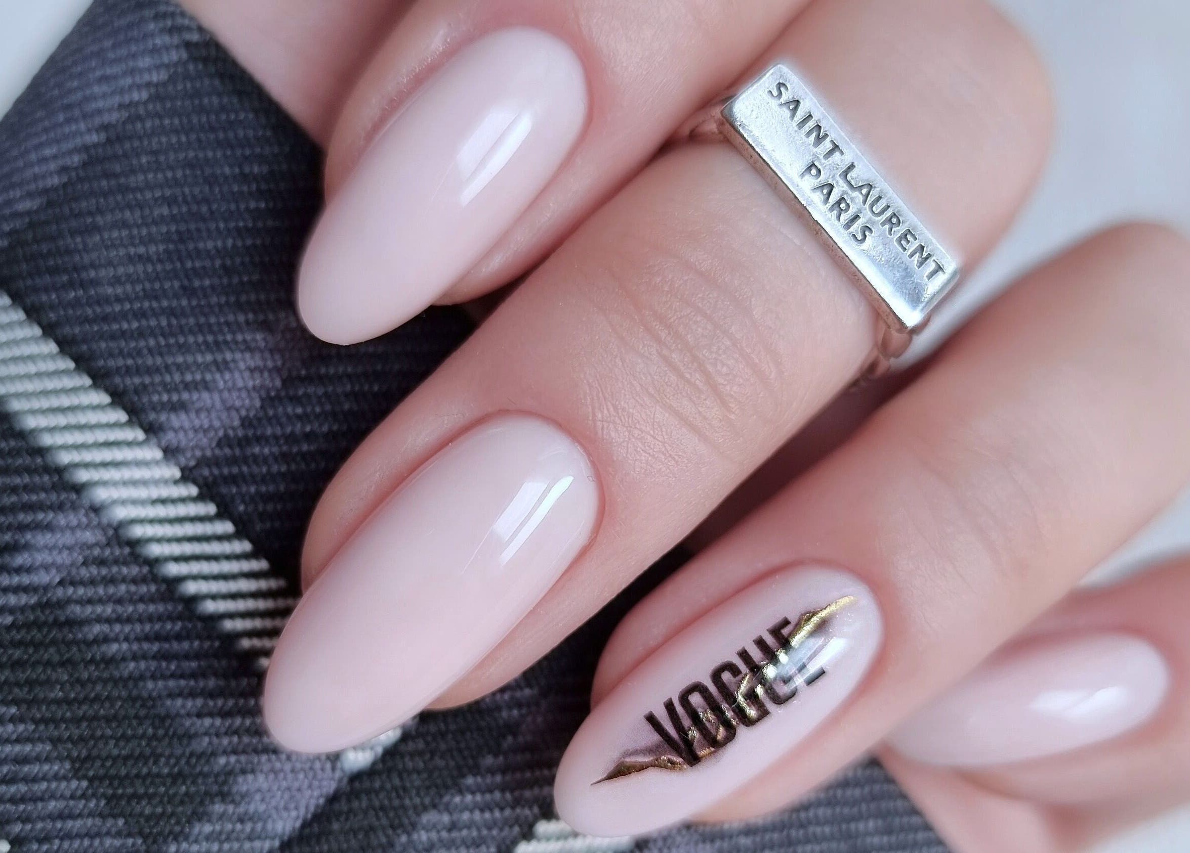 Stylish manicure with Vogue print at Zhekova Nails Academy, Epsom, England, GB.