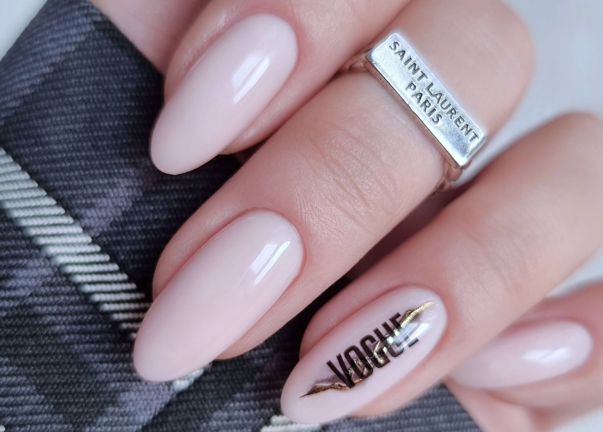 Stylish manicure with Vogue print at Zhekova Nails Academy, Epsom, England, GB.