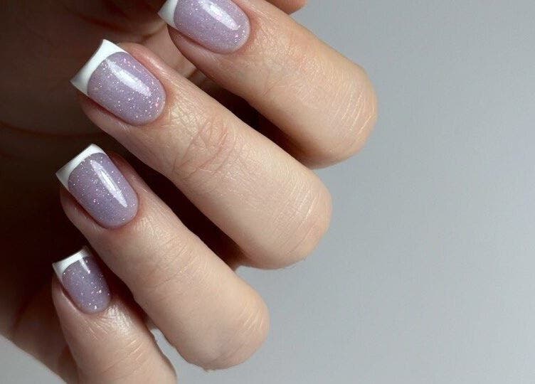 French manicured nails at Zhekova Nails Academy, Epsom, England, GB. Glossy and stylish design.