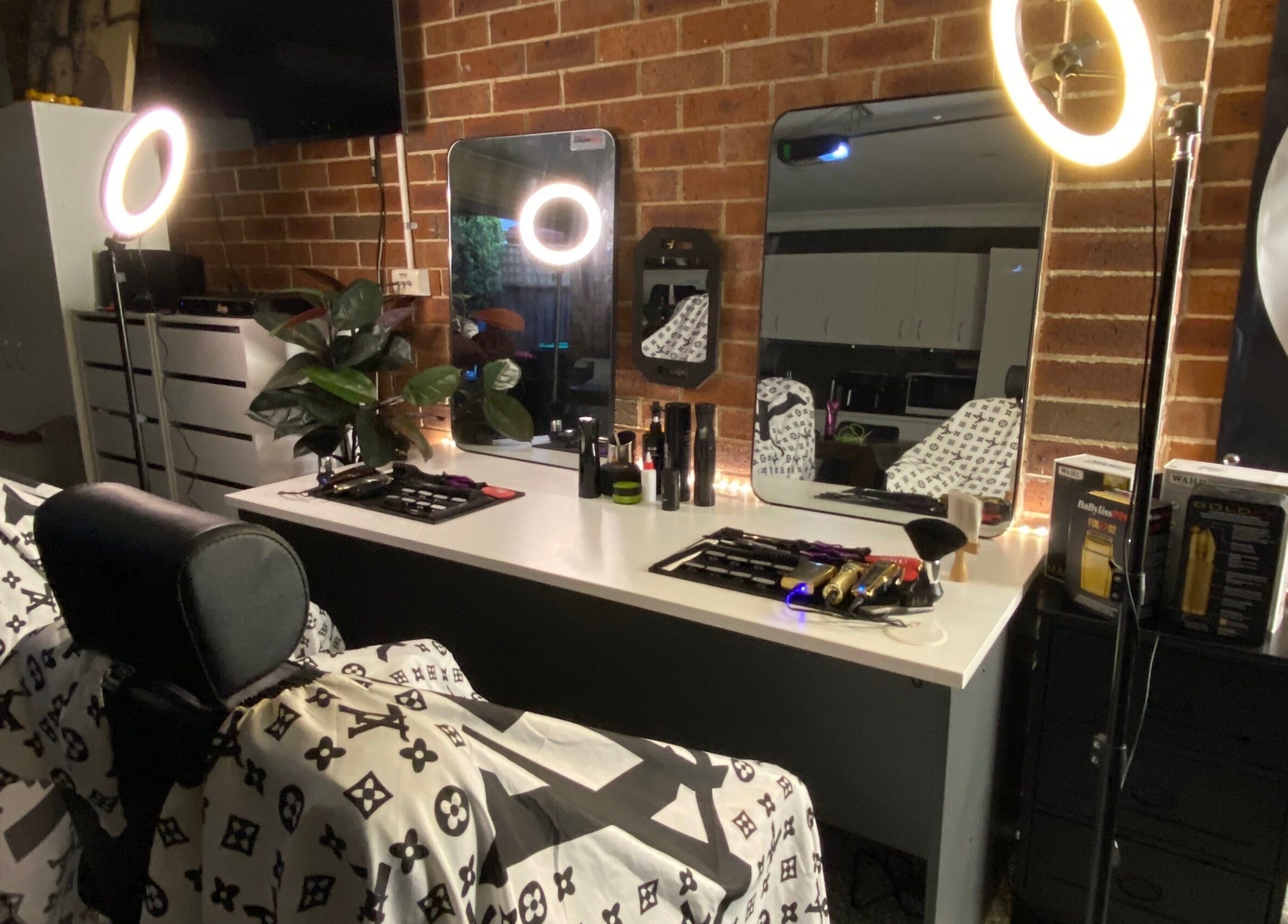 Makeup and styling station at Prasad Productions in Prestons, New South Wales, AU, featuring illuminated mirrors.