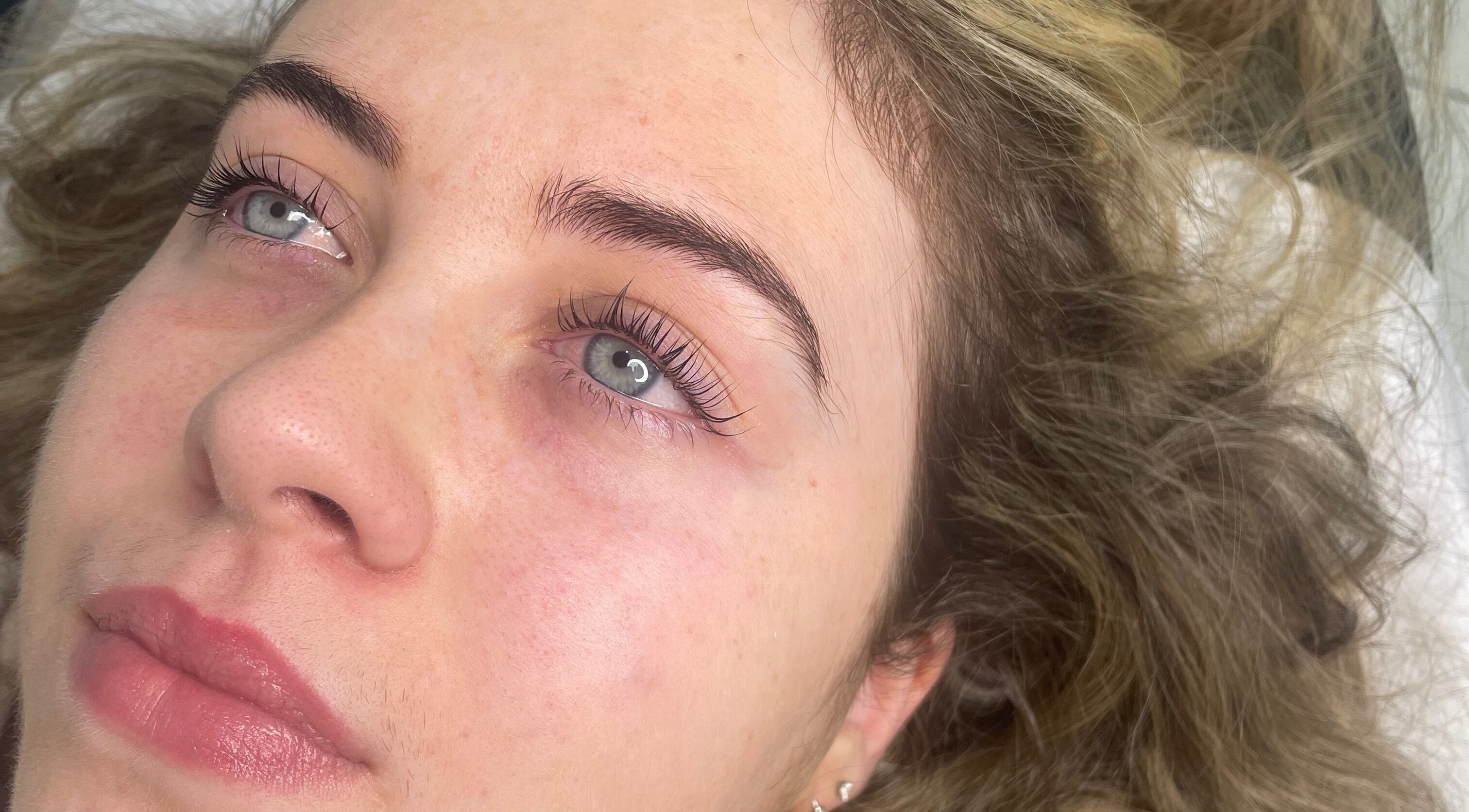 Close-up of natural lashes at Adara Ink, Chadderton, England, GB, showcasing professional beauty treatment results.