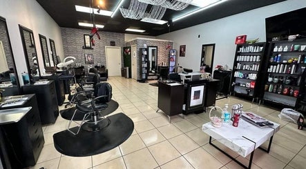 Interior of Mj's Hair Salon in Howell, Michigan, US, featuring modern styling stations and product displays.