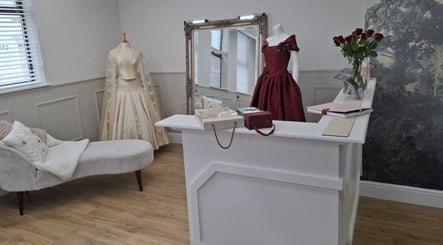 Silk Powder Limited, Leicestershire GB, elegant dresses on display in a chic room.