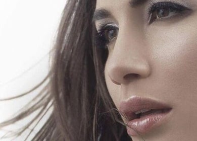 Close-up of a woman's flawless complexion at Silk Powder Limited, Leicestershire, GB.