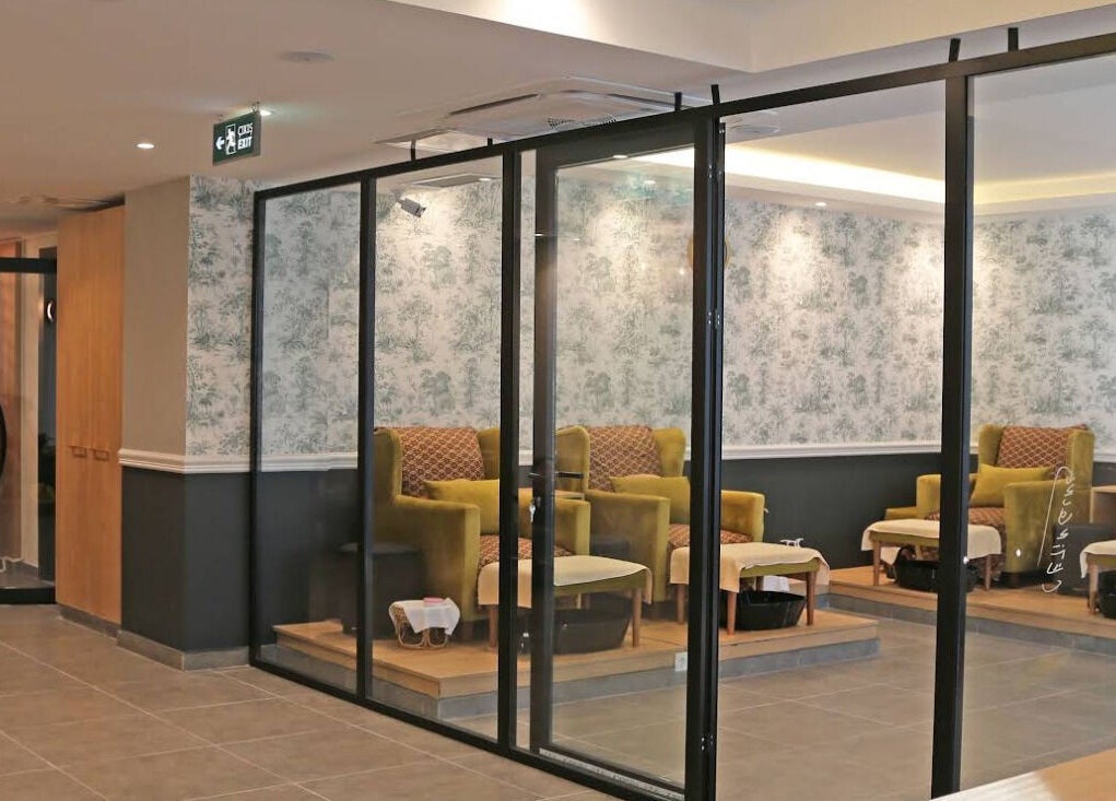 Cozy foot spa area at Let's Relax Foot Spa Cihangir in İstanbul, İstanbul, TR, featuring plush seating.