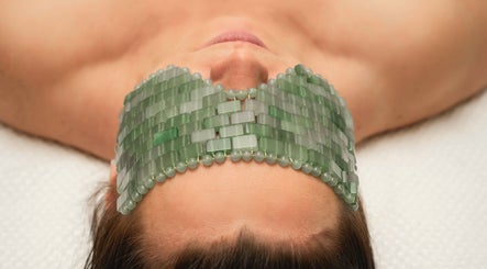 Jade mask application at Hygge Space Holistic Face Massage in Galway, County Galway, IE, enhancing relaxation.