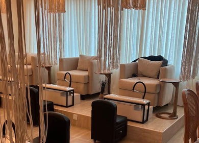 Cozy pedicure area at Lavandula Salon in Riyadh, Riyadh Province, SA with plush chairs and chic decor.
