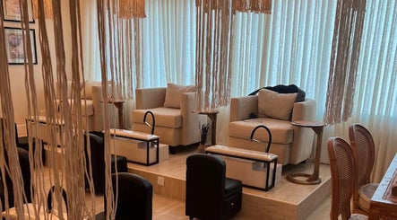 Cozy pedicure area at Lavandula Salon in Riyadh, Riyadh Province, SA with plush chairs and chic decor.
