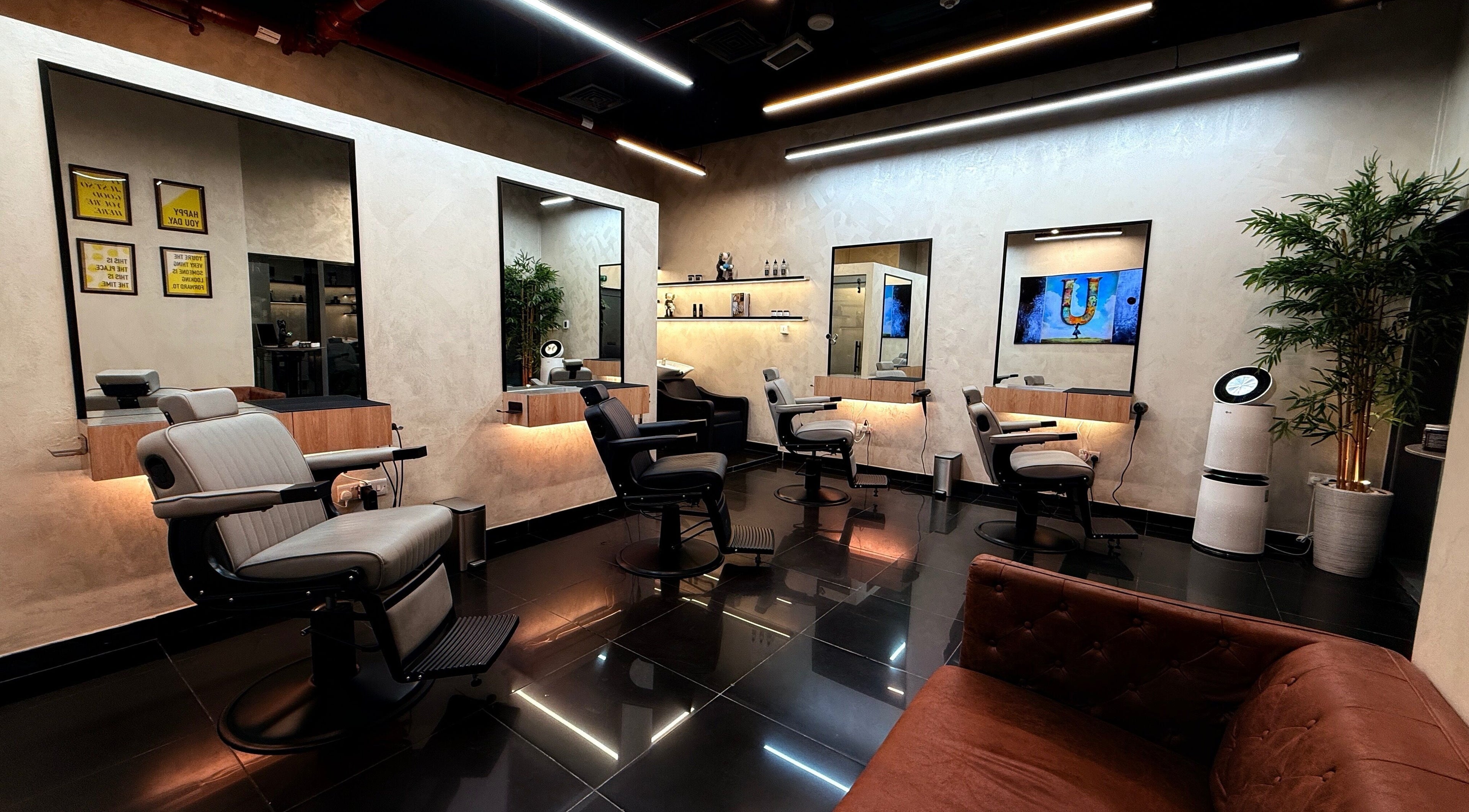 U Barbershop in Dubai, Dubai, AE features stylish barber chairs and modern décor for an upscale grooming experience.