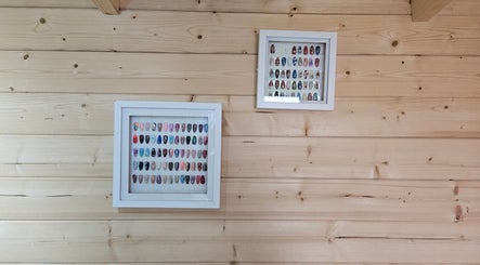 Framed nail art displays at Shells Nailz, Chelmsford, England, GB highlighting creative designs.