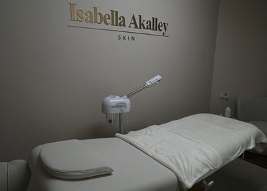Elegantly designed treatment room at Isabella Akalley Skin, Stourbridge, England, GB, featuring a plush treatment bed.