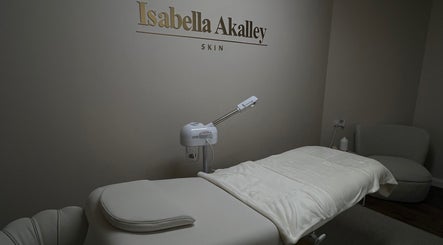 Elegantly designed treatment room at Isabella Akalley Skin, Stourbridge, England, GB, featuring a plush treatment bed.