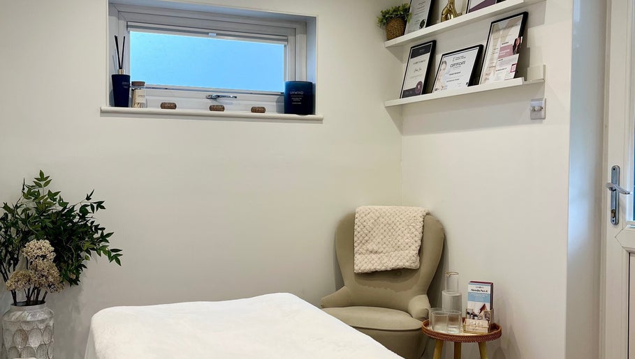 Cozy treatment room at Brows & Beauty by Georgia in Effingham, England, GB, featuring elegant decor and relaxing atmosphere.