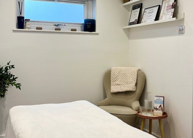Peaceful treatment room at Brows & Beauty by Georgia, Effingham, England, GB, featuring calming decor.