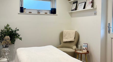 Peaceful treatment room at Brows & Beauty by Georgia, Effingham, England, GB, featuring calming decor.