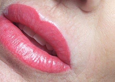 Close-up of vibrant lips at Cupids Glow, Bolton, England, GB, showcasing beauty services.