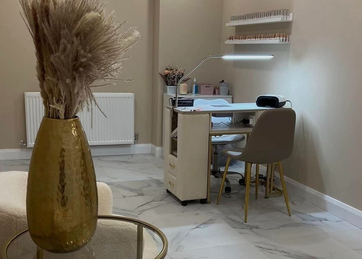 Cozy beauty station at Studio 3, Swatragh, Northern Ireland, GB with a vase of pampas grass on display.