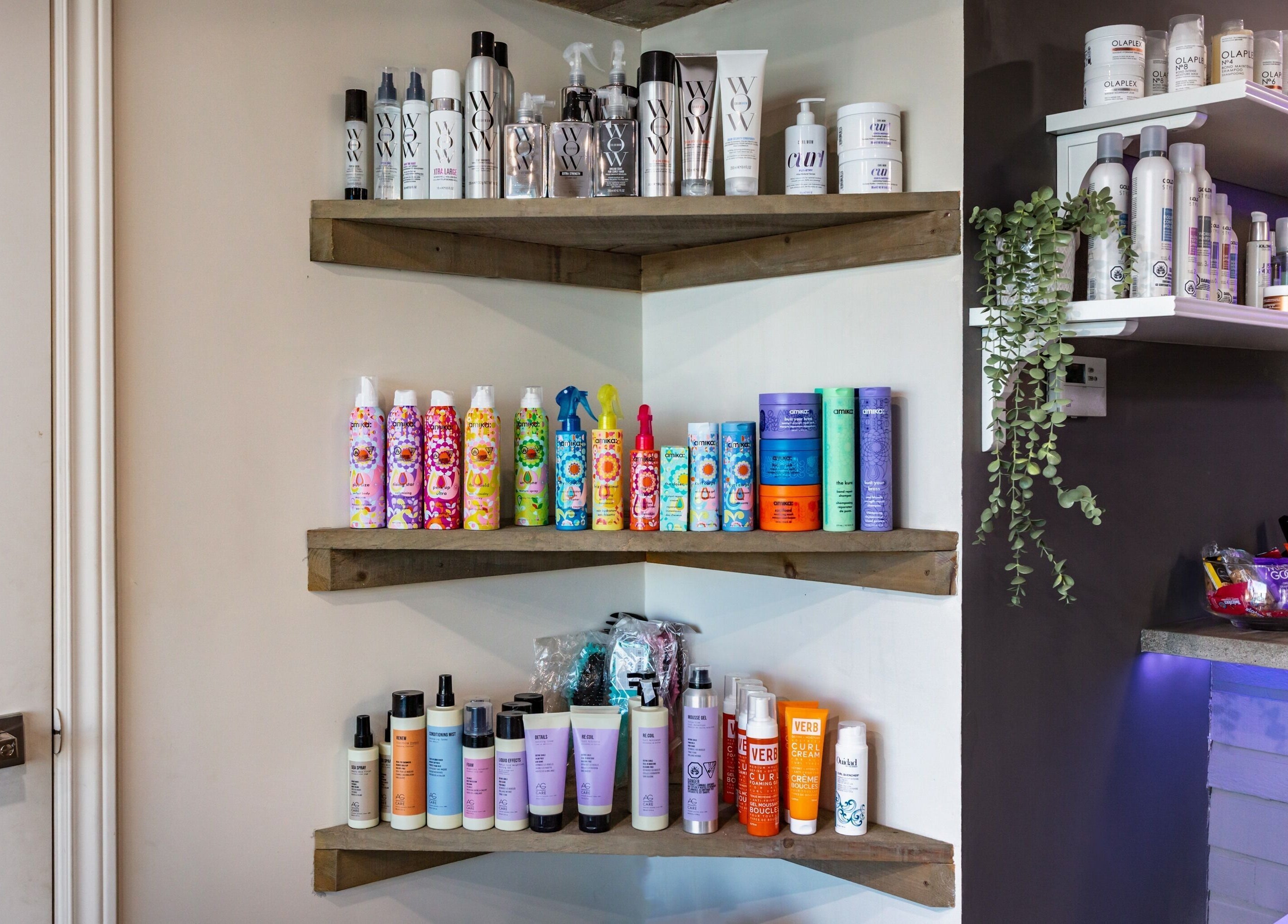Diverse hair care products on shelves at Mirror Mirror Hair Studio, Oshawa, Ontario, CA.