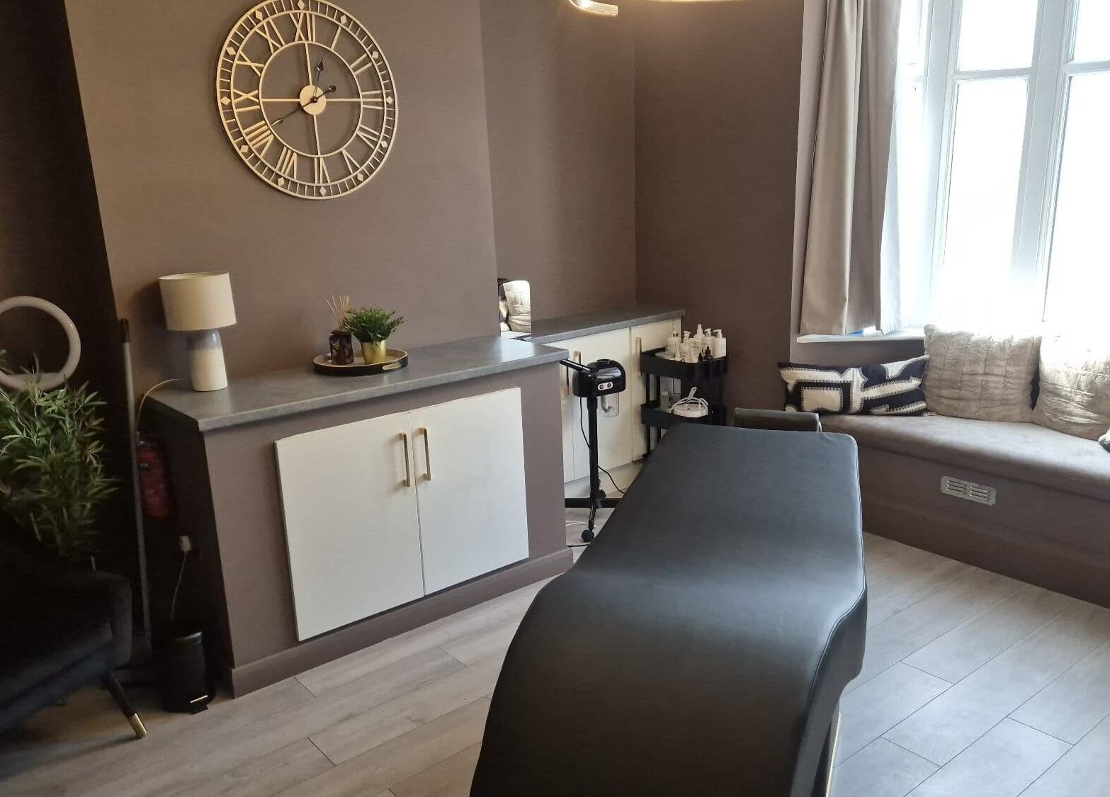 Relaxing treatment room at Skin Deep Beauty Room, Scunthorpe, England, GB. Elegant decor with a modern touch.