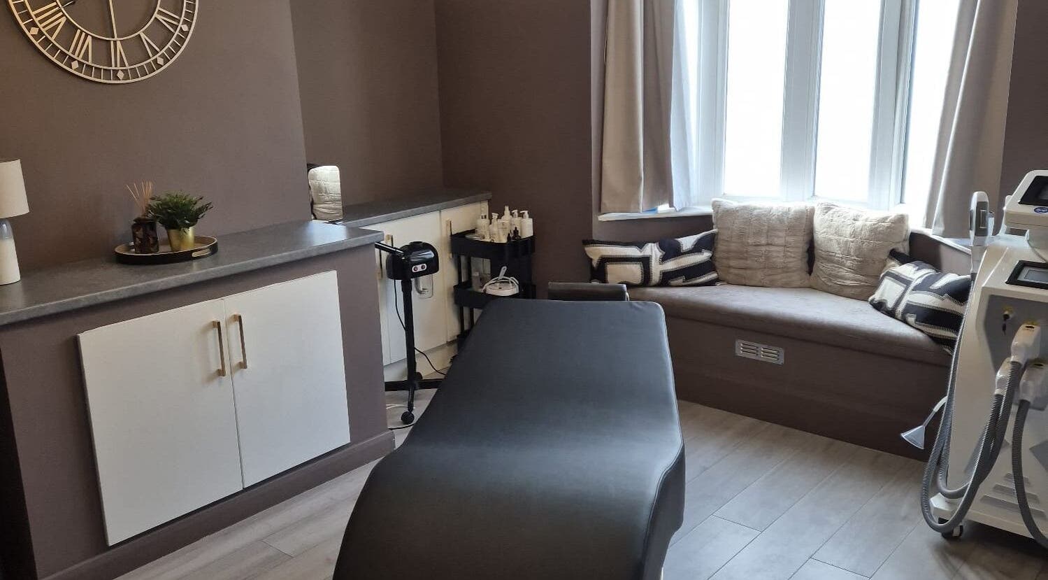 Treatment room interior at Skin Deep Beauty Room, Scunthorpe, England, GB, featuring a massage bed and cozy decor.
