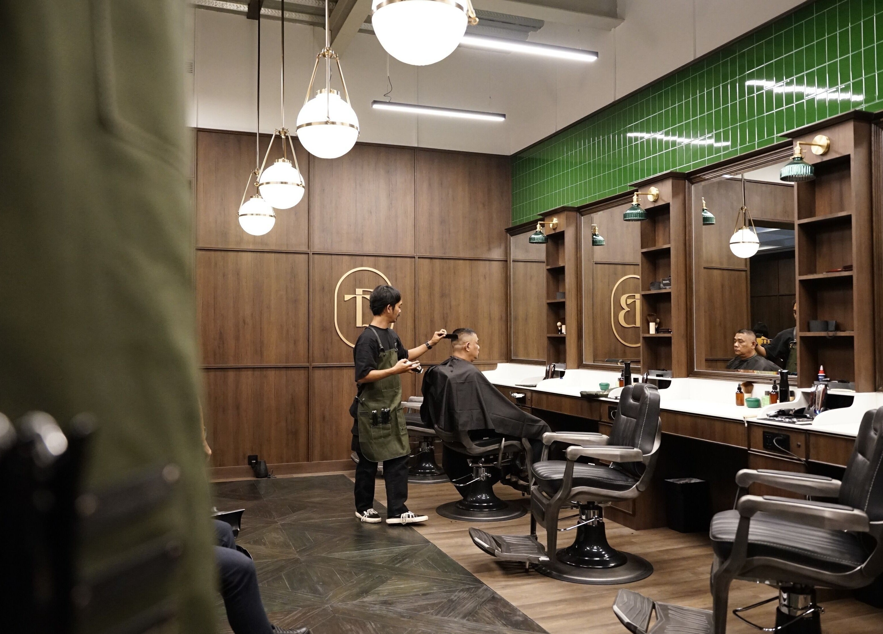 Modern interior of The Barber Bar in Daerah Khusus Ibukota Jakarta with stylish decor and professional service.