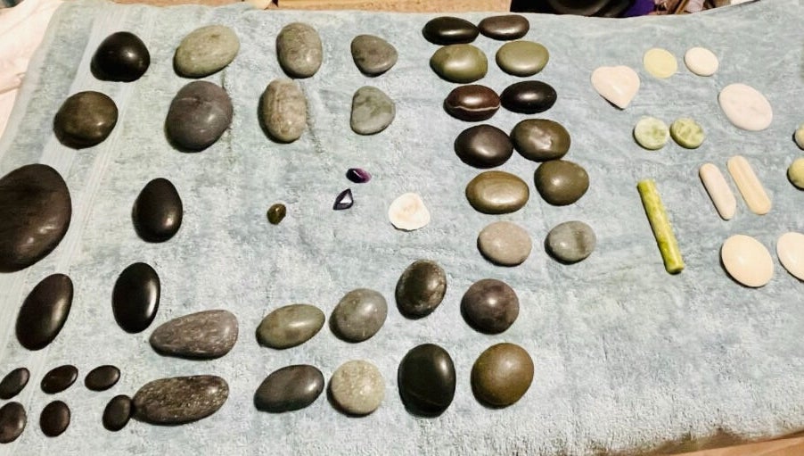 Hot stones prepared for massage at MASSAGE BY ZOE, Corby, England, GB. Ideal for relaxation therapies.