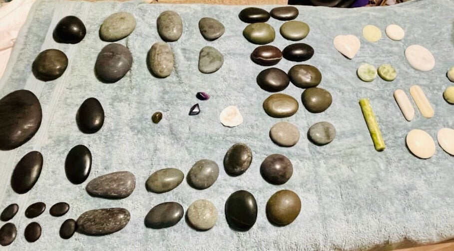Hot stones prepared for massage at MASSAGE BY ZOE, Corby, England, GB. Ideal for relaxation therapies.