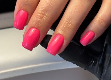 Beautiful pink manicure at Salon 31 by Rosie, Heath And Reach, England, GB showcasing nail artistry.