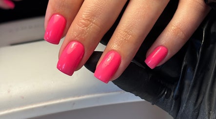 Beautiful pink manicure at Salon 31 by Rosie, Heath And Reach, England, GB showcasing nail artistry.