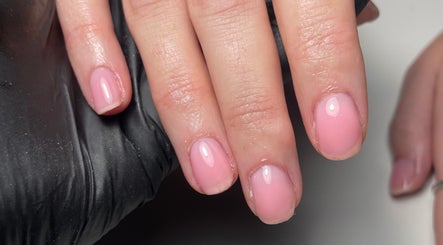 Manicured nails with pink polish at Beauty Therapist by Charlotte, Kegworth, England, GB.