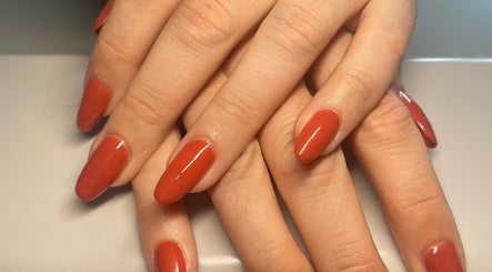 Beautiful red manicure at Beauty Therapist by Charlotte, Kegworth, England, GB showcases elegant nail art.