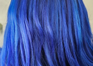 Vibrant blue hair color showcased at Hair By Tory, Stowmarket, England, GB, highlighting bold styling expertise.