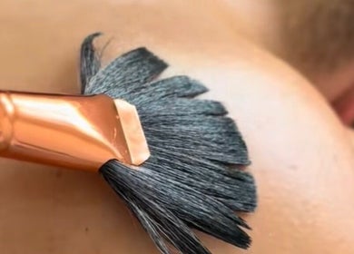 Relaxing skin treatment at SKNFORM, Newton-le-willows, England, GB using a luxurious brush.