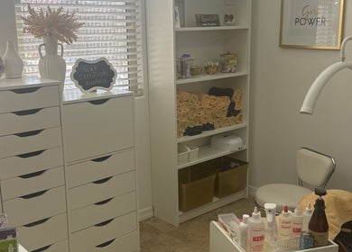 Relaxing spa nook at House of Pedi’s by Lydia in Tucson, Arizona, US, featuring neatly arranged towels and products.